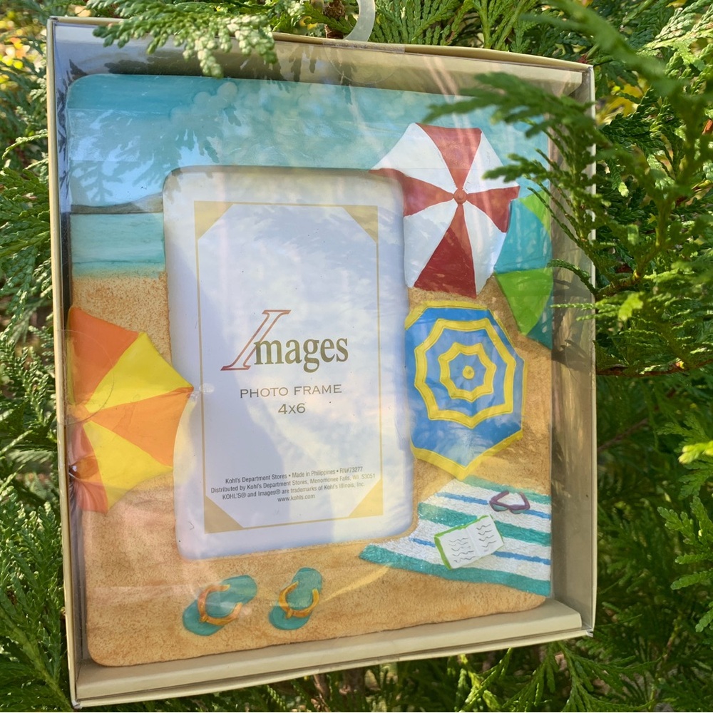 Brand new 4”x6” beach themed picture frame.